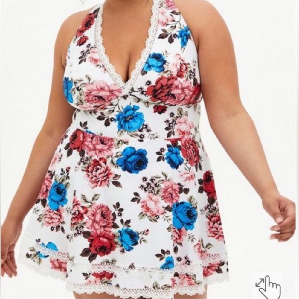 Torrid Swim dress with attached bottom and criss cross back.